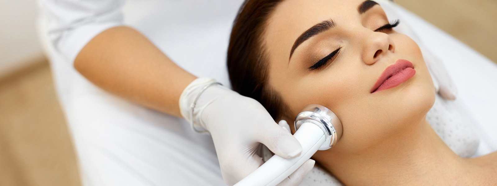 Body Care. Woman Receiving Face Skin Analysis. Cosmetology Body Care. Woman Receiving Face Skin Analysis. Cosmetology