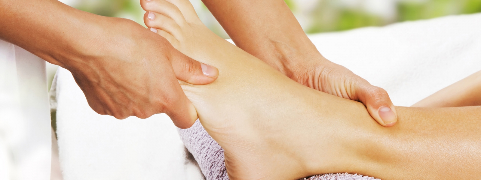 Foot massage in the spa salon Foot massage in the spa salon